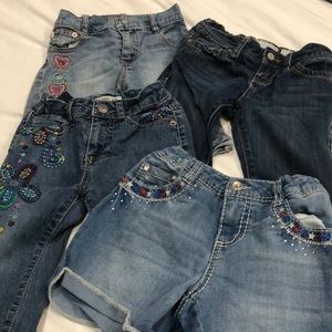 Bundle/ Lot of 4 Capris and shorts.